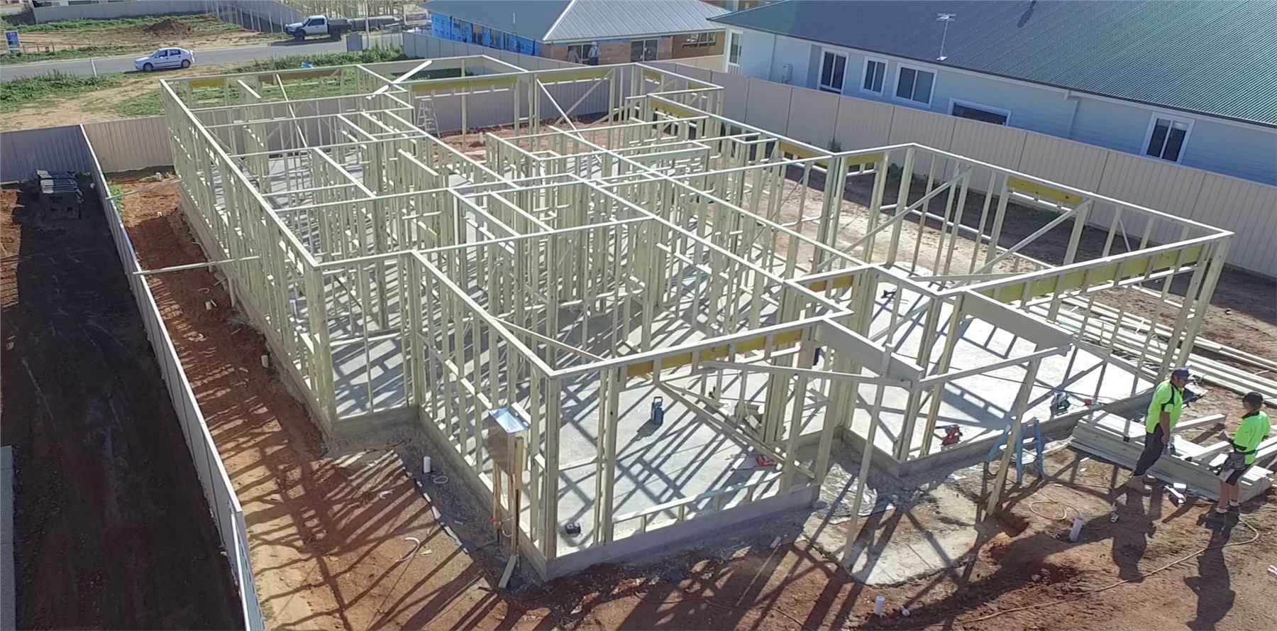 Drone construction progress photo showing building frame